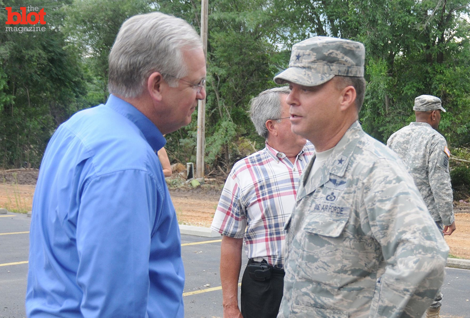Missouri Gov. Jay Nixon (left) speaks with Brig. Gen. David Newman of the state's Air National Guard during a weather event last year. (Photo: Missouri National Guard/handout)