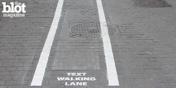 Jeff Myhre makes a pitch for pedestrian texting lanes so those who are so busy and important they have to text-walk can get the hell out of everyone's way. (news.com.au photo)