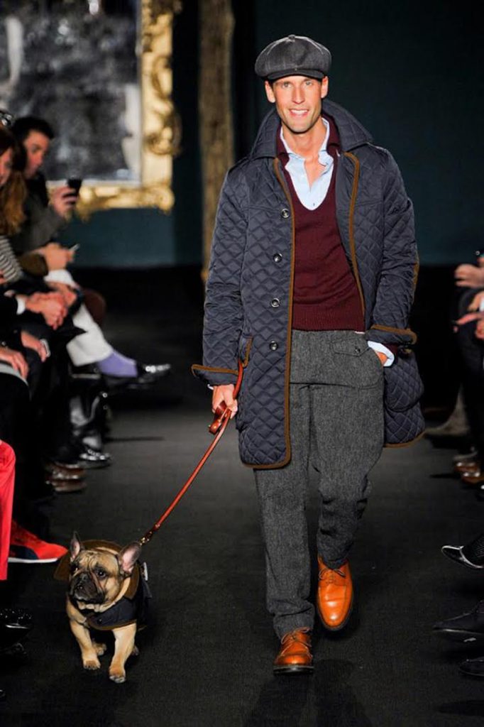 '(UN)Glamorous' filmmaker Pedro Andrade and his dog Mr. Miles walk the runway for Michael Bastian in 2012. (Photo courtesy Pedro Andrade)