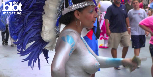 Many fear the topless women wandering among the costumed characters in the "Crossroads of the World" will bring Times Square abreast to its seedy past. (YouTube photo)