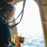 Russian Orthodox Priests Spray City With Holy Water from Plane